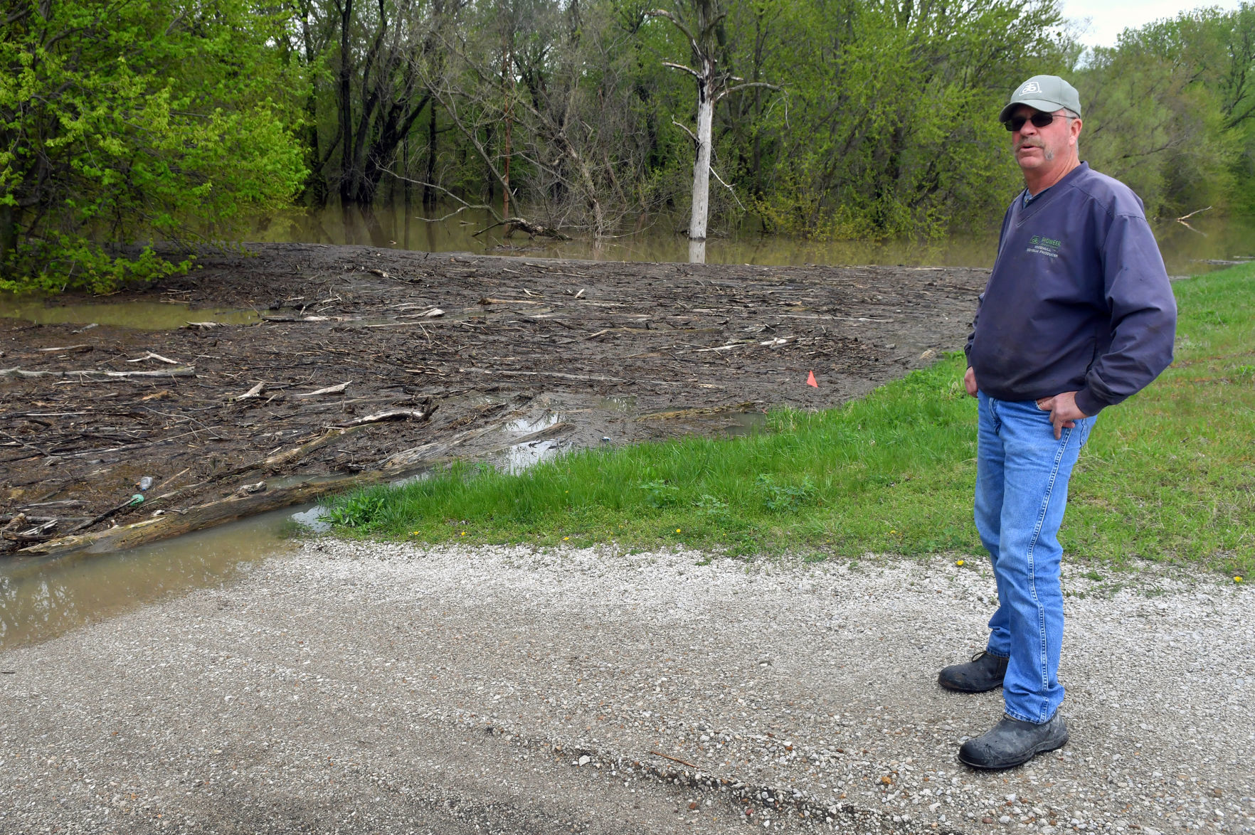 Farmers dealing with flooded fields.